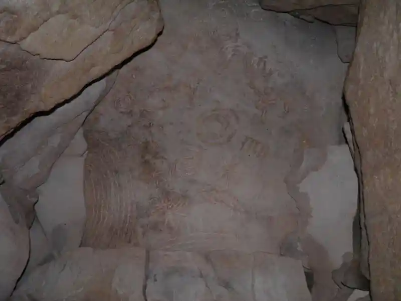 Solar disc and other solar symbols on a stone in the grave of Jeremiah